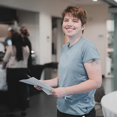 Georgie Brown holds a piece of paper.