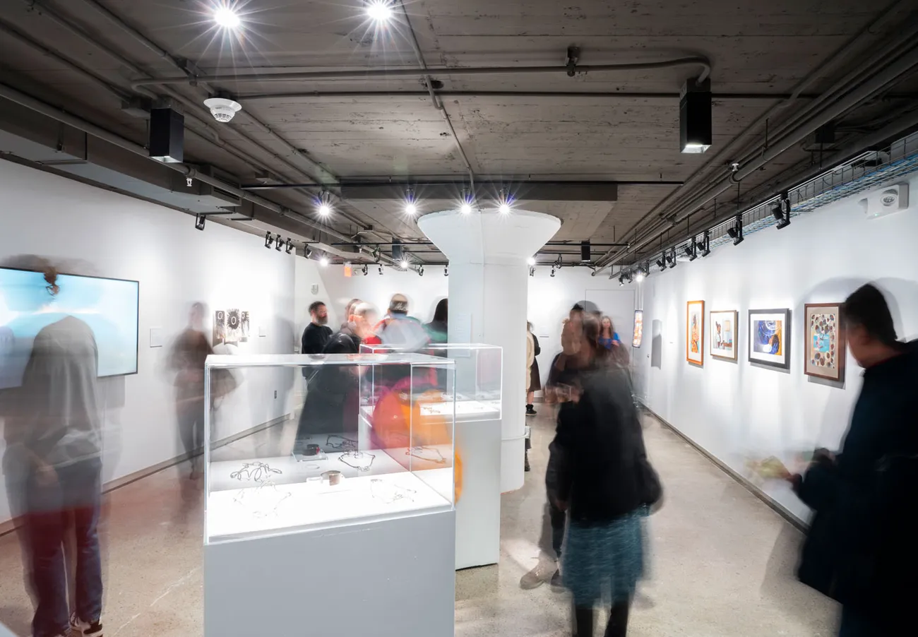 People in a gallery looking at artwork