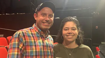 Alex Jainchill and Bianca Mercado-Boller pose and smile.