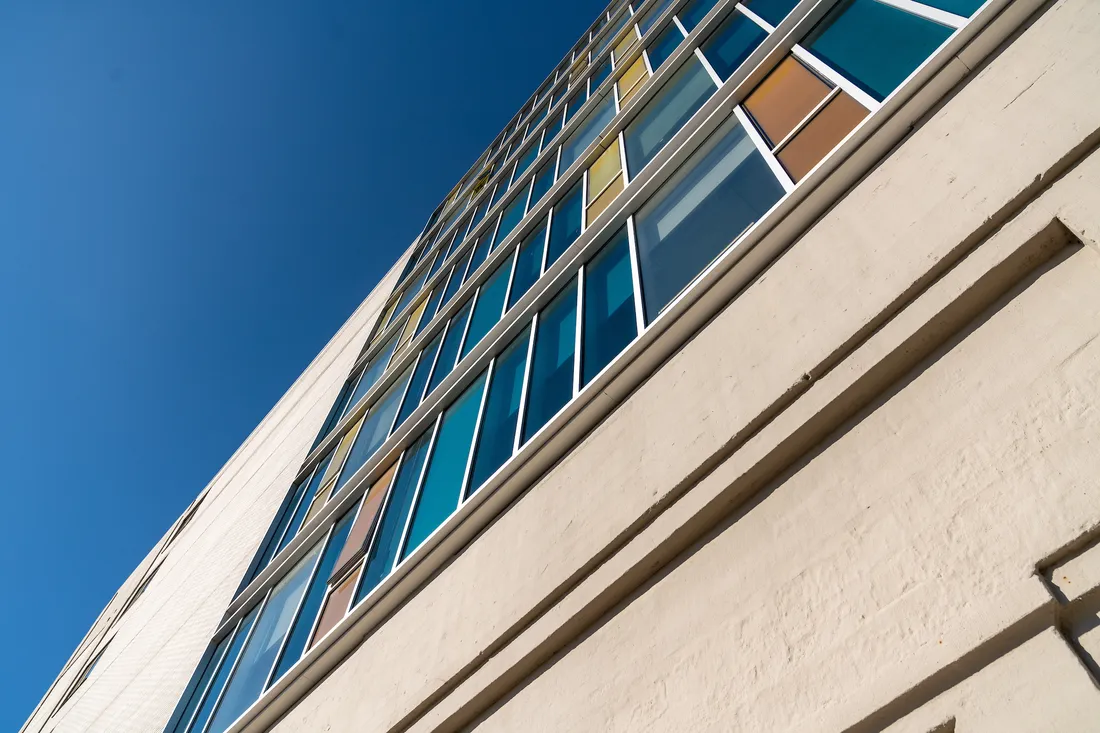 Looking up at the exterior of the Nancy Cantor Warehouse.