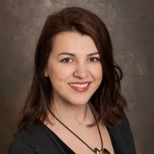 Headshot of Adriana Gorea.