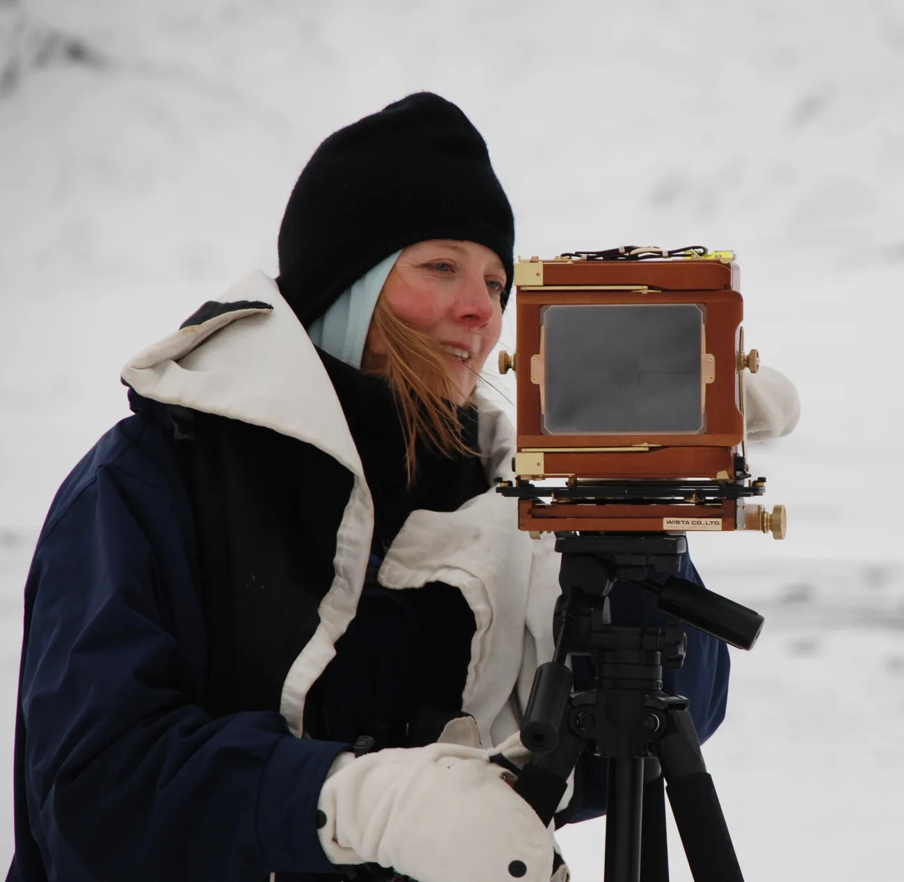 Susannah Sayler uses a camera.
