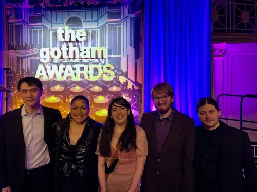 Evan Bode stands with other winning student filmmakers.