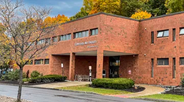The exterior of Comstock Art Facility in the fall.