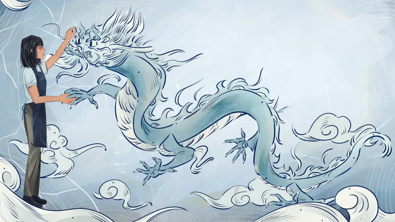 A person paints a dragon.