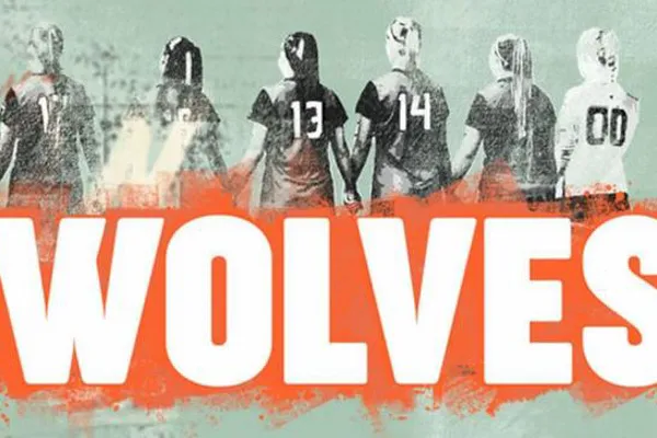 Promotional banner with the text “The Wolves.”